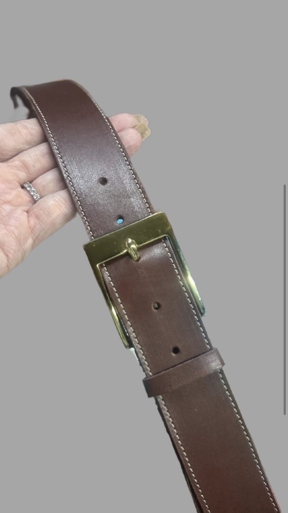 Hand-stitched brown leather belt with brass buckle