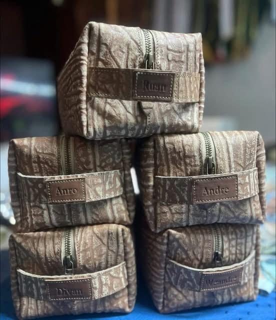 Personalised Dopp kits, each with a hand-tagged name