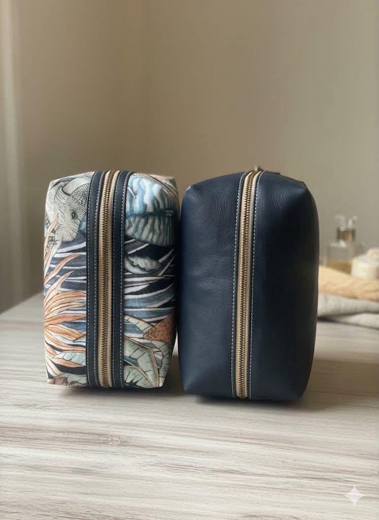 Dopp kits standing side by side