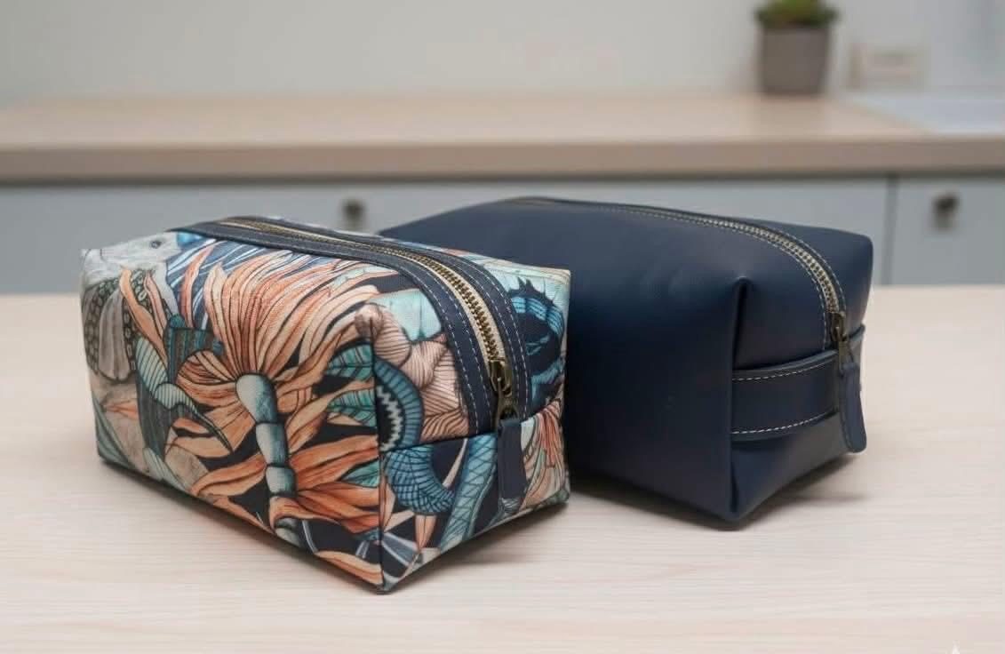 Navy leather and floral fabric Dopp kits paired