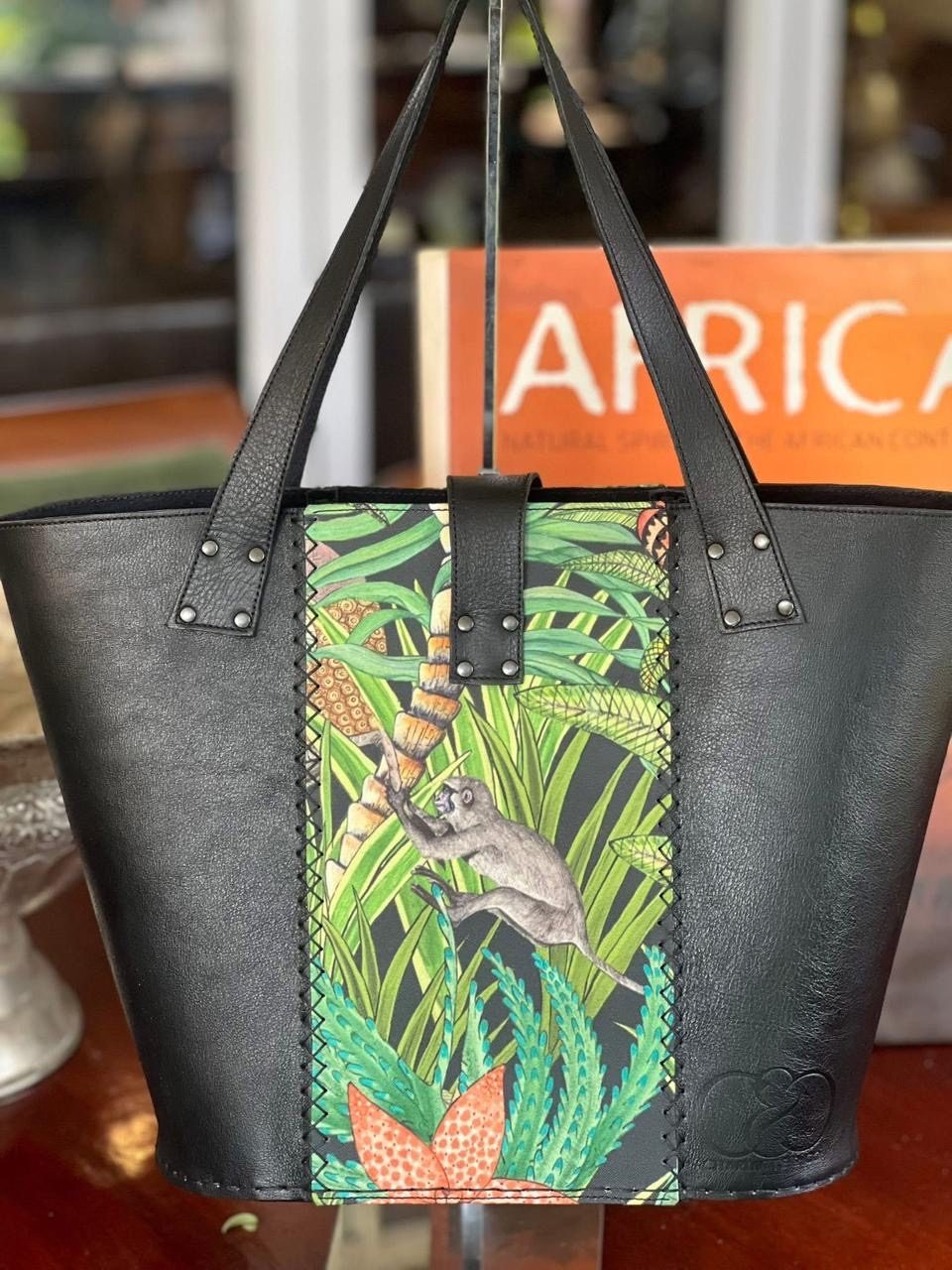 Black leather tote with monkey panel