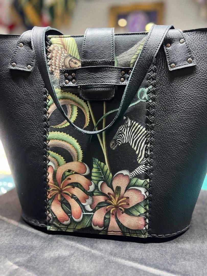 Black leather tote with zebra and floral panel
