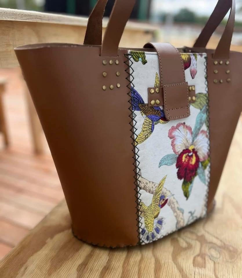 Brown leather tote with hummingbird and orchid panel