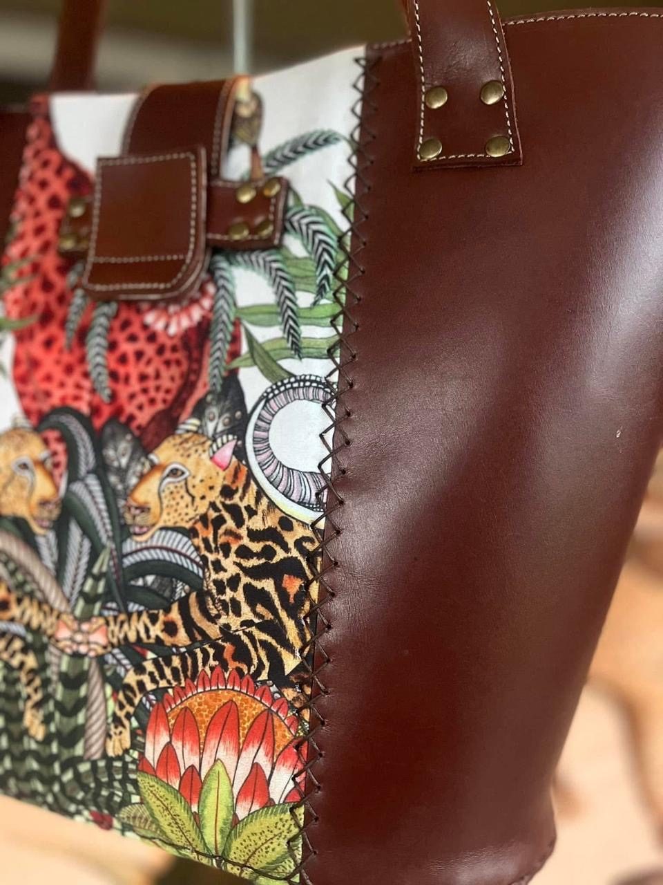 Close-up of a leopard and protea tapestry panel