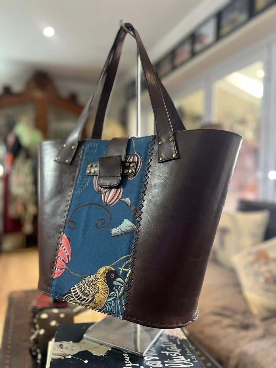 Espresso leather tote with weaver bird panel