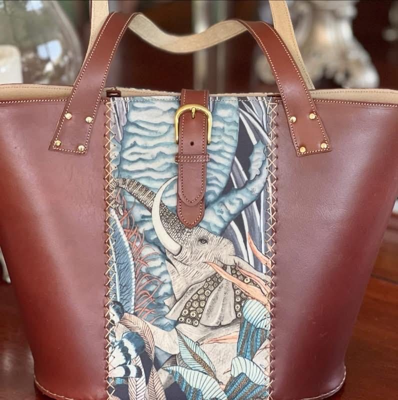 Maroon leather tote with elephant tapestry panel, alternate angle