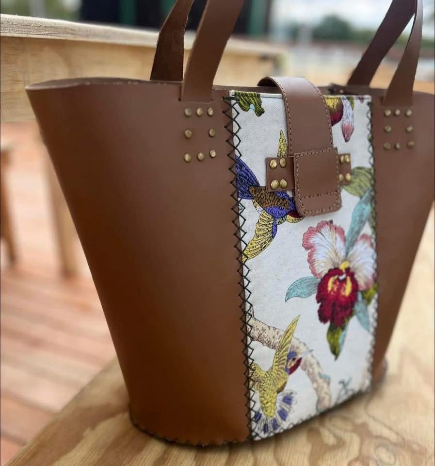 Tan leather tote with hummingbird and orchid panel